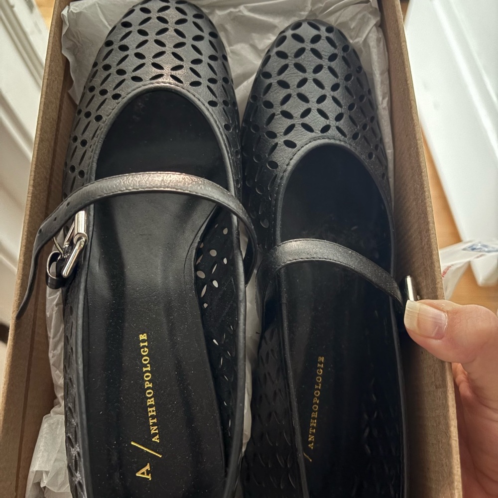 Anthropologie Black Flats Sleek and Polished Design NIB